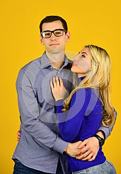 Happy family day. couple in love. man and woman embrace. smart looking guy wear glasses. sexy bonde girl hug her photo