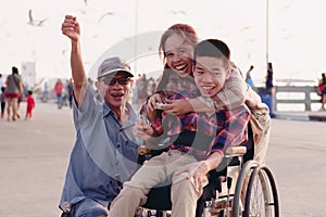 Happy family with disability person concept.