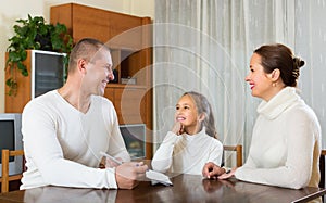 Happy family with documents