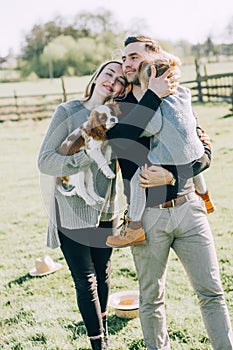 Happy family with a dog in the park photo