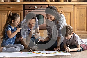 Happy family drawing on paper poster with children.