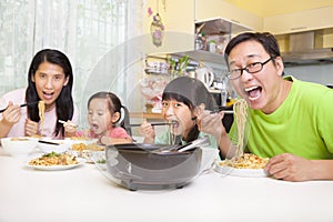 Happy Family Eating noodles
