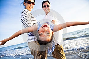 Happy family enjoy summer vacation on the beach