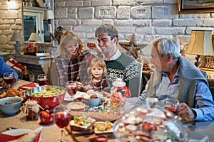 Happy family enjoying Christmas holidays together