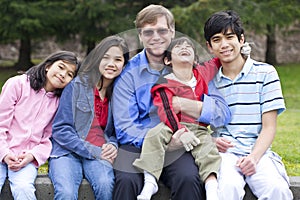 Happy family enjoying day at park