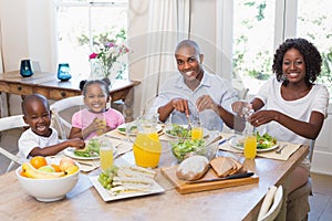 Happy family enjoying a healthy meal together