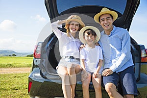Happy family enjoying road trip and summer vacation