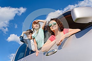 Happy family enjoying road trip and summer vacation