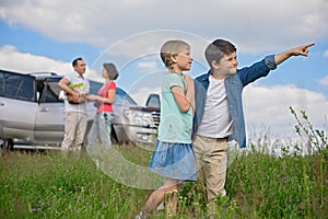 Happy family enjoying road trip and summer vacation