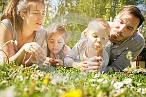 Happy family enjoying in spring day together.