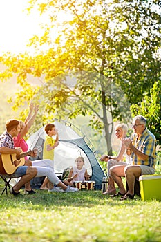 Happy family enjoying on summer day photo