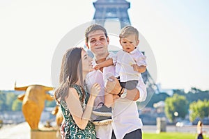 Happy family enjoying their vacation in Paris, France