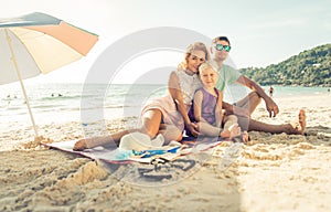 Happy family enjoying time on the beach