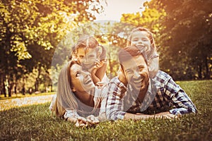 Happy family enjoying together in summer day.