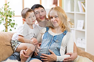Happy Family Expecting New Baby. Pregnant Woman