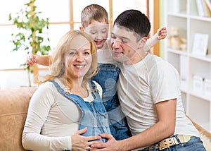 Happy Family Expecting New Baby. Pregnant Woman