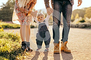 Happy family father, mother and child daughter outdoor  enjoying  sunset  - Image