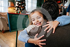 Happy family and father's day. Father and his daughter hugging and having fun together