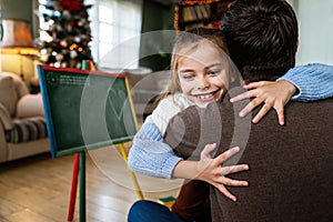 Happy family and father& x27;s day. Father and his daughter hugging and having fun together