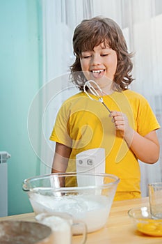 Happy family funny kids are preparing the dough, bake cookies in