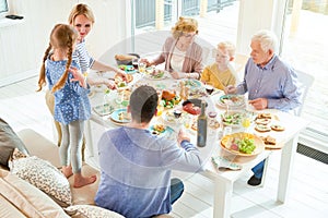 Happy Family Gathering in Sunlight