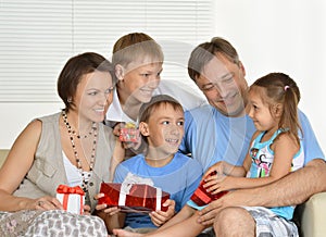 Happy Family with gifts