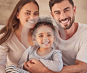 Happy family, girl and an interracial couple smiling and excited about spending quality time together. Portrait of