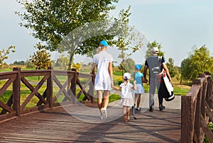 Happy family in golf country club