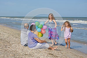 Happy family. Grandmother, grandfather and two joyful granddaughters.