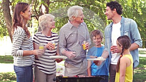 Happy family having a barbecue