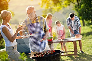 Happy family having a barbecue party