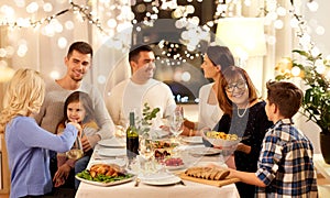 Happy family having dinner party at home