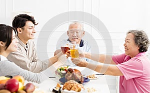 Happy family having dinner together