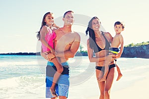 Happy Family Having Fun at the Beach