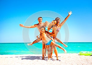 Happy family having fun at the beach