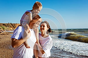 Happy family having fun on summer vacation.