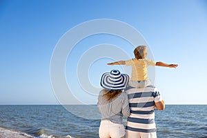 Happy family having fun on summer vacation