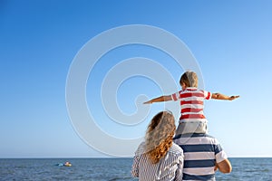 Happy family having fun on summer vacation