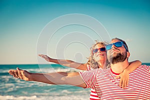 Happy family having fun on summer vacation