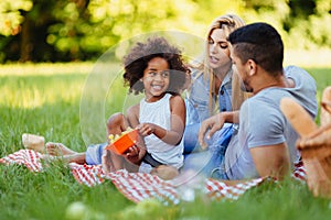 Happy family having fun time on picnic