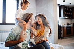 Happy family having fun times at home