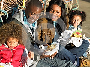 Happy family having picnic