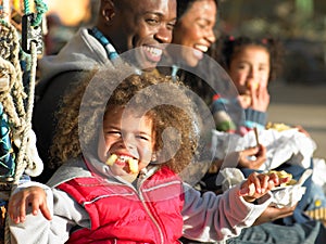 Happy family having picnic