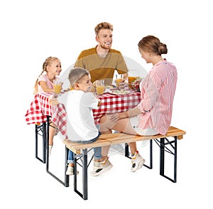 Happy family having  at table on white background