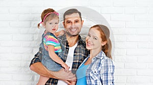 Happy family home on brick wall background