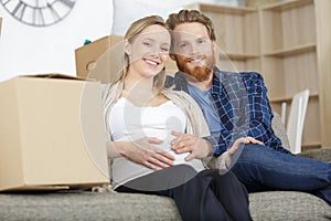 happy family home owners on moving day concept