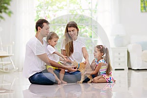 Happy family with kids at home