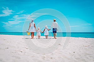 Happy family kids walk on tropical beach vacation