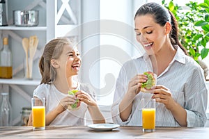 Happy family in the kitchen.