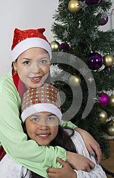 Happy family laying under the christmas tree